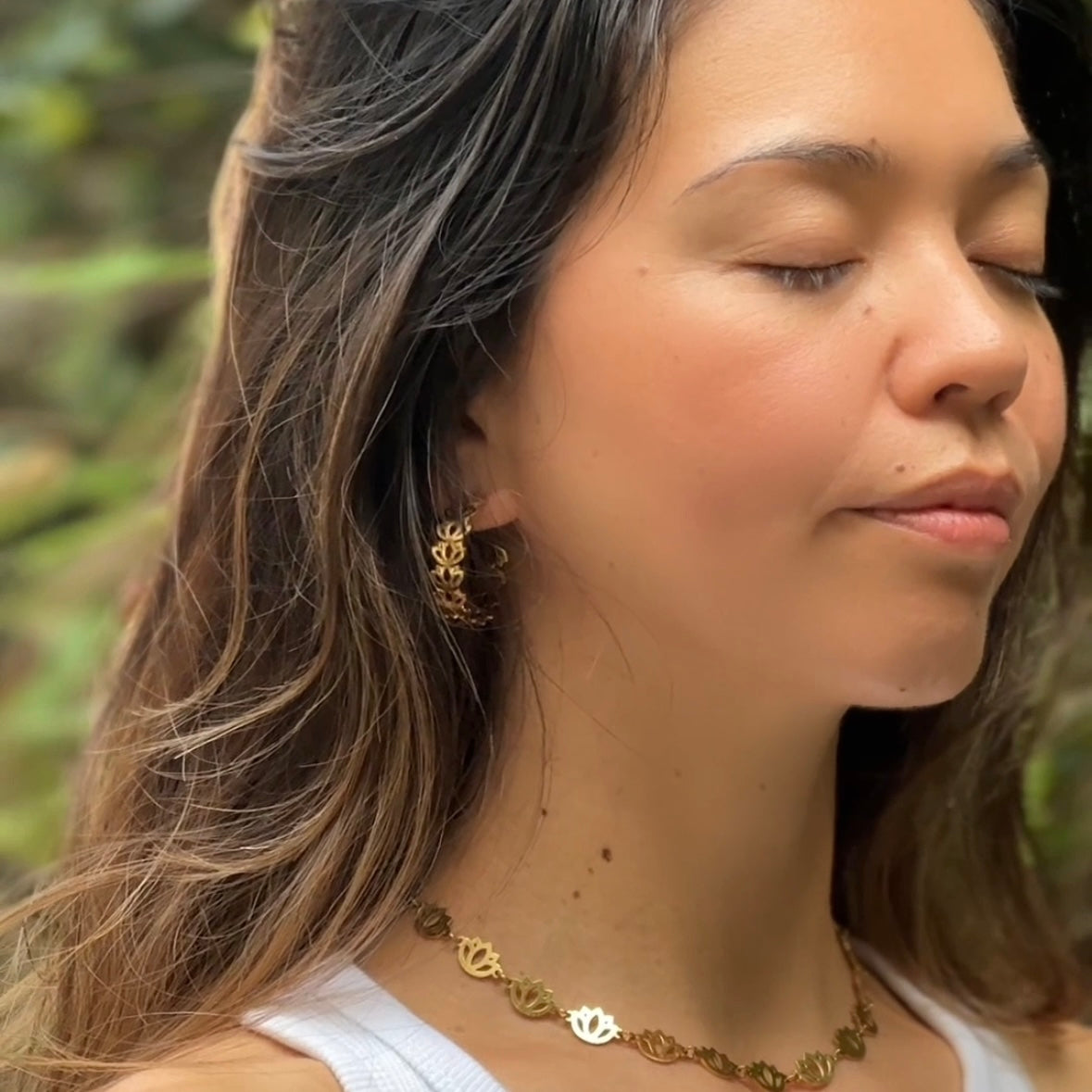 Spiritual yogi wears hoops gold jewellery